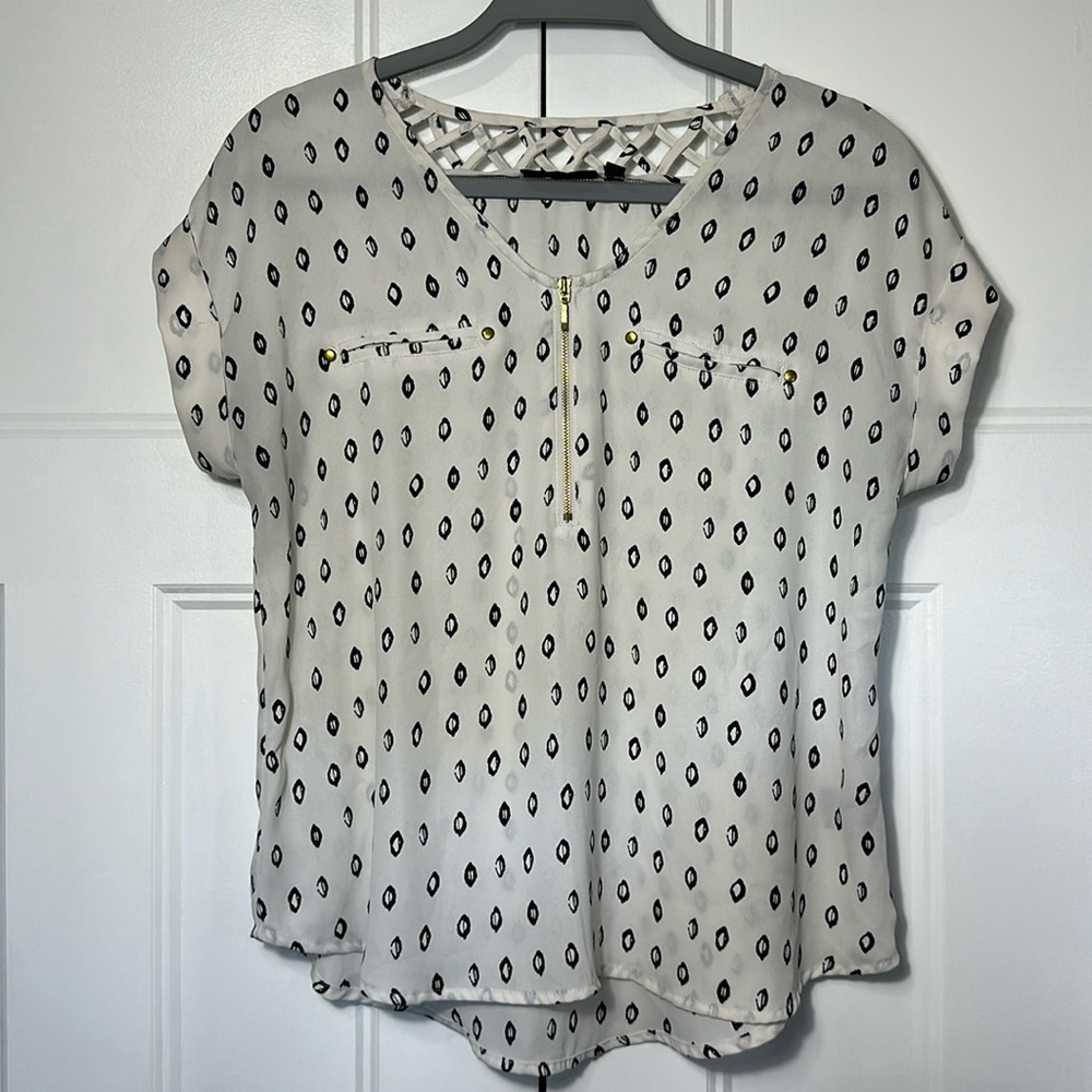 Off-white and black abstract pattern top